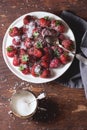 Garden strawberries with sugar and cream Royalty Free Stock Photo