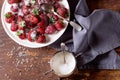 Garden strawberries with sugar and cream Royalty Free Stock Photo