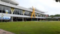 a garden at the airport in Pekanbaru with the architecture of the front and typical Malay carvings (selembayung)