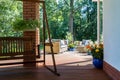 Garden swing and a cozy terrace Royalty Free Stock Photo