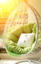 Garden swing with mattress and cushion in balcony in the morni Royalty Free Stock Photo