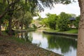 The garden there are small streams, green trees