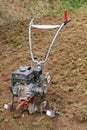Garden tiller for field cultivating. Royalty Free Stock Photo