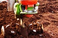 Garden tiller in work Royalty Free Stock Photo