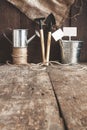 Garden tool, shovel, rake, watering can, bucket, bag on a wooden Royalty Free Stock Photo