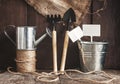 Garden tool, shovel, rake, watering can, bucket, bag on a wooden Royalty Free Stock Photo