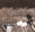 A garden tool, a shovel, a rake, a watering can, a bucket, table Royalty Free Stock Photo