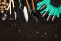 Garden tools and fertile soil. Royalty Free Stock Photo