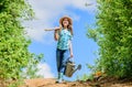 Garden tools, shovel and watering can. kid worker sunny outdoor. family bonding. spring country side village. future Royalty Free Stock Photo