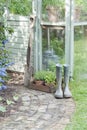Garden Tools And Wellington Boots