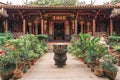Garden in a traditional ancient architecture building in southern China, `Zhuang Family` for Chinese characters