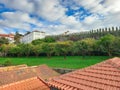 Garden trees in front of the Fernandine Walls of Porto