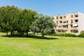 Garden of Troia covered with green trees and apartment complexes, Grandola municipality, Portugal
