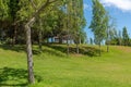 Garden of Troia covered with green trees on a sunny day, Grandola municipality, Portugal