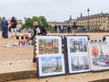 In the garden of the Tuileries, Paris, tourists buy souvenirs