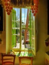 Garden view through traditional Cypriot house window in Lefka, C