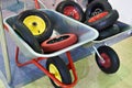 Garden wheelbarrows with spare wheels in shop Royalty Free Stock Photo