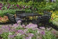 Garden with Wooden Dining Table Set Royalty Free Stock Photo