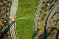 Garden Worker Watering Newly Installed Natural Grass