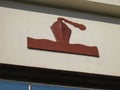 Bas-relief frieze figure of a ship representing ocean and water transport on the Gardena, California Post Office exterior.