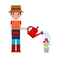 gardener boy watering can and potted flowers Royalty Free Stock Photo