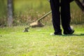 The gardener cutting grass by lawn mower Royalty Free Stock Photo