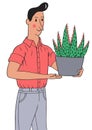 A gardener holding an aloe vera plant