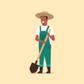 Gardener holding shovel african american country man working in garden gardening eco farming concept full length Royalty Free Stock Photo