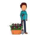 gardener man with shovel and flowers gardening