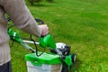 Gardener mowing the lawn