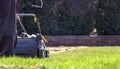 Gardener Operating Soil Aeration Machine on Grass Lawn Royalty Free Stock Photo