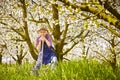 Gardener spade watering can meadow trees