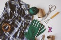 gardener still life composition with spring preparations for yard work and transplanting