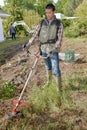 Gardener using a strimmer Royalty Free Stock Photo