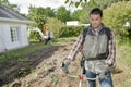 Gardener using a strimmer Royalty Free Stock Photo