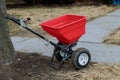 The gardener works with seeding and fertilizing the lawn sows fresh grass Royalty Free Stock Photo