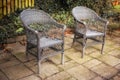 Gardeners corner. Armchairs in a relaxation garden space in a backyard of a home. Decorative outdoor furniture or chairs