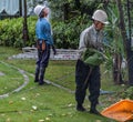 Gardeners Working In A Garden, Tokyo, Japan