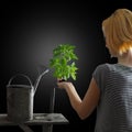 Gardening concept - woman holding a plant Royalty Free Stock Photo