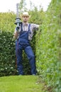 Gardening, cutting hedge Royalty Free Stock Photo