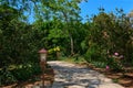 Gardening design ideas. Natural pavers, paths, decorations, lanterns. Rich foliage, bushes and trees. Winding paths