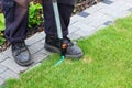 Gardening - edging lawn along the path