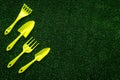 Gardening equipment concept on green grass background top view copy space Royalty Free Stock Photo