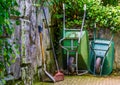 Gardening equipment, Wheelbarrows with a shovel and rigid, Garden upkeep tools Royalty Free Stock Photo