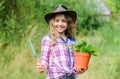 Gardening. farming and agriculture. spring season. hellow summer. small girl planting with shovel. earth day