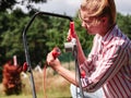 Woman being mowing lawn with lawnmower Royalty Free Stock Photo