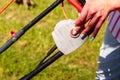 Woman being mowing lawn with lawnmower Royalty Free Stock Photo