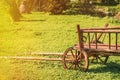 Gardening And Housekeeping. Vintage Cart On Summer Sunny Day. Decorative Peasant Cart On Summer Lawn. Bright Sunny Day Royalty Free Stock Photo