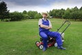 Gardening, man mowing the lawn Royalty Free Stock Photo