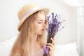 Gardening and people concept happy young woman smelling lavender flowers. Cute little Girl holds a bouquet of lavender. Lifestyle Royalty Free Stock Photo